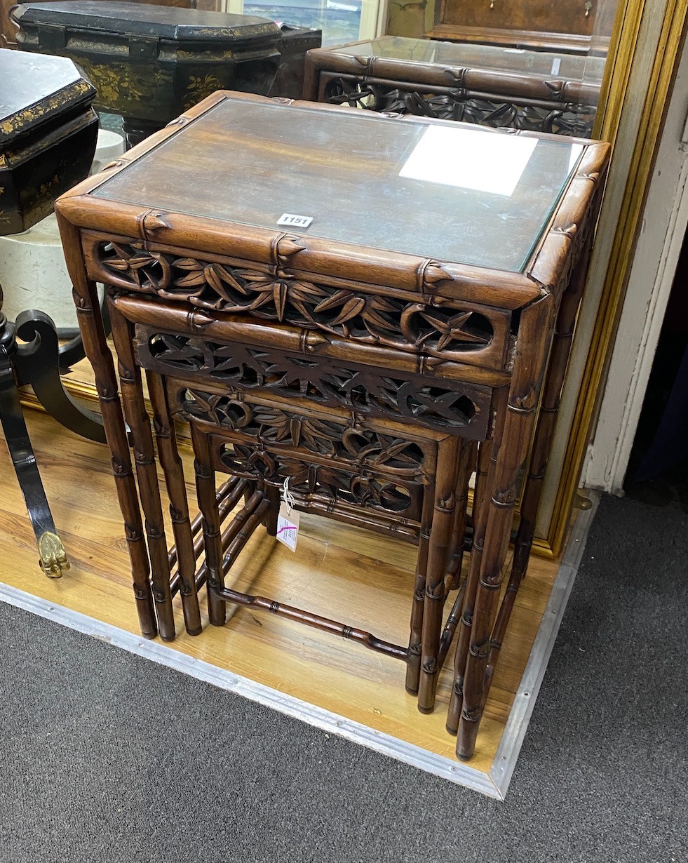 A quartetto nest of four Chinese rectangular hongmu tea tables, width 51cm, depth 36cm, height 72cm